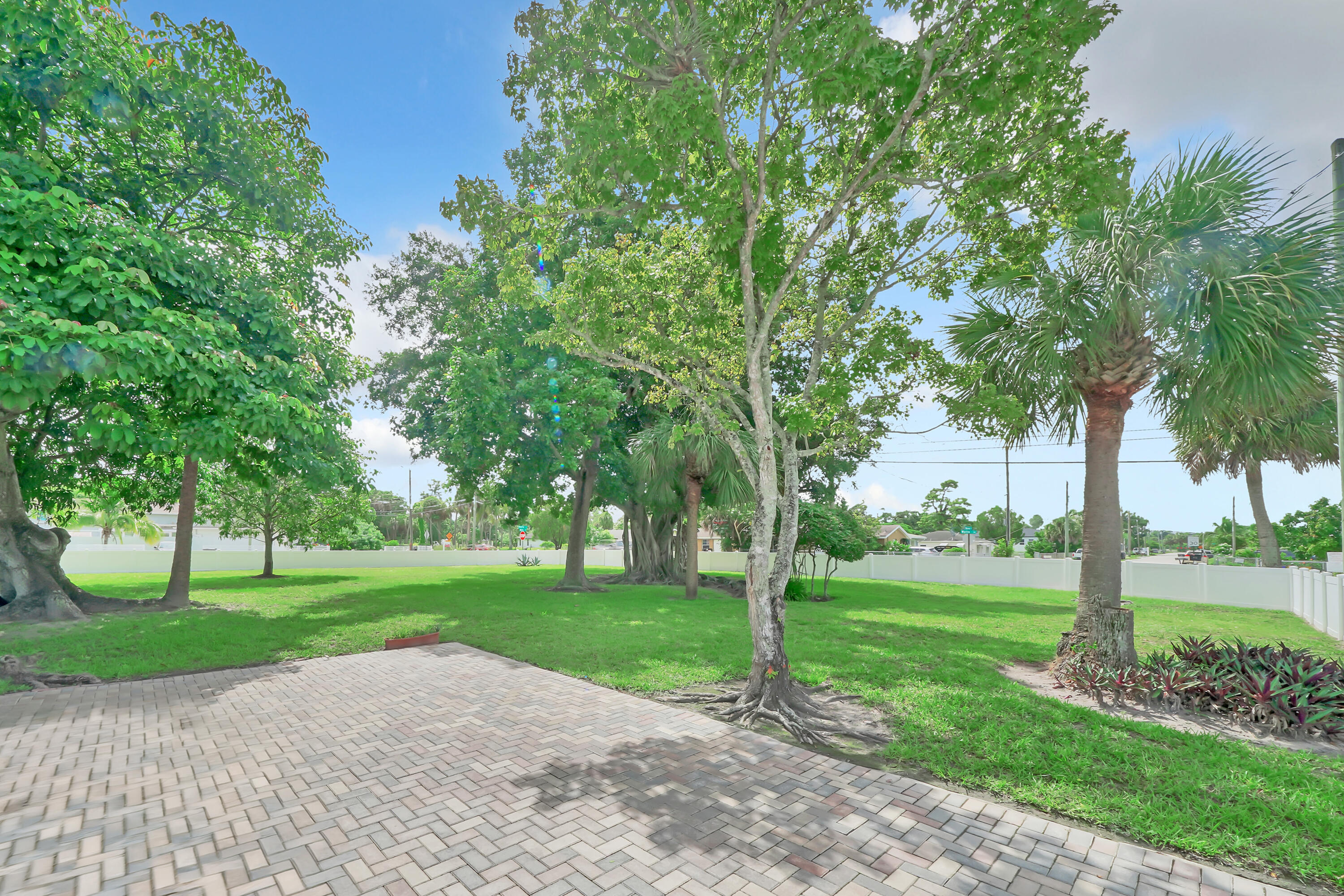 5271 Wallis Road Royal Palm Estates, FL 33415 - Photo 20 of 25 13 Frontyard