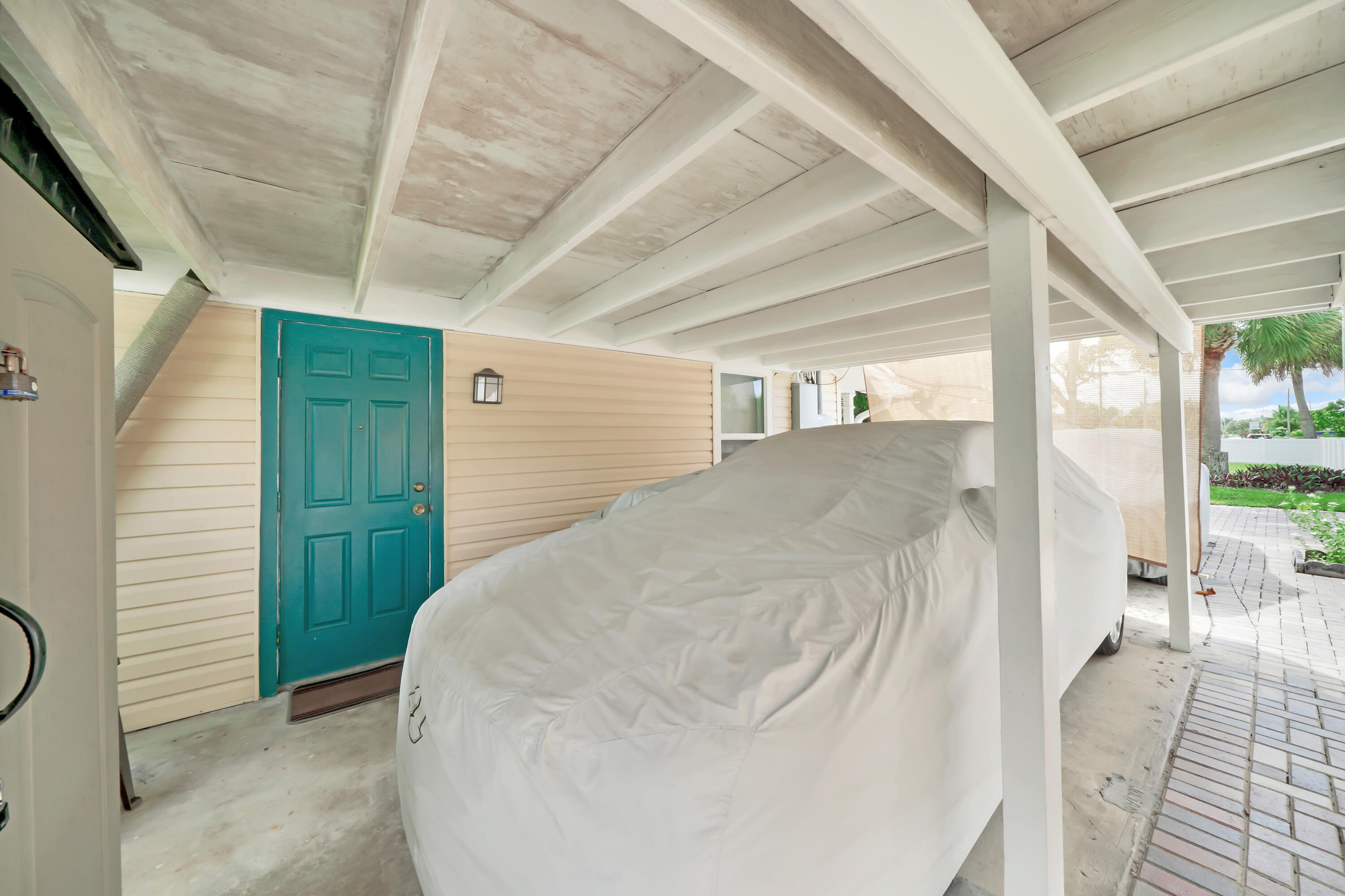 5271 Wallis Road Royal Palm Estates, FL 33415 - Photo 21 of 25 12 Driveway (1)