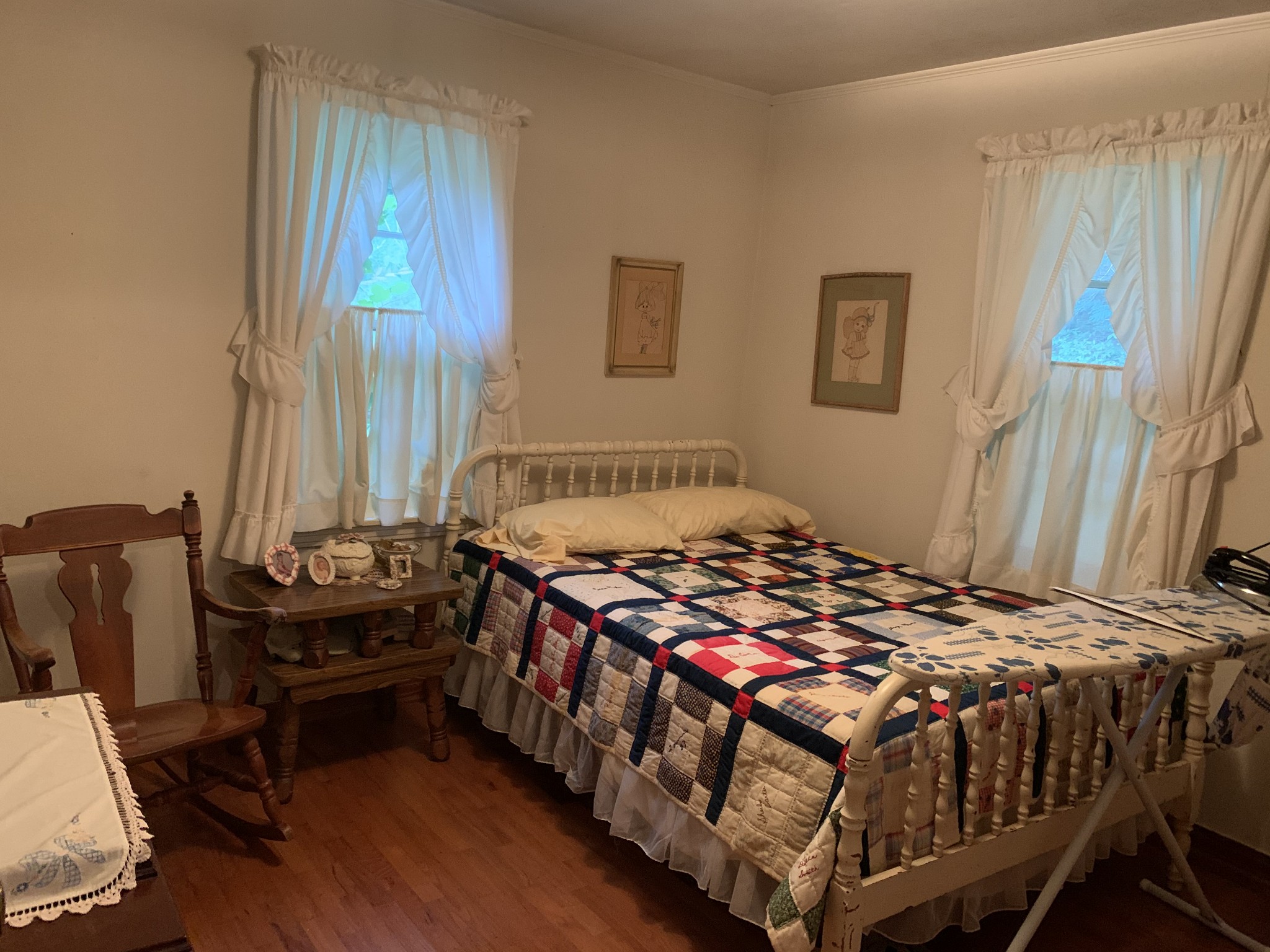 1585 Laster School Road Huron, TN 38345 - Photo 12 of 14 a bedroom with a bed and a window