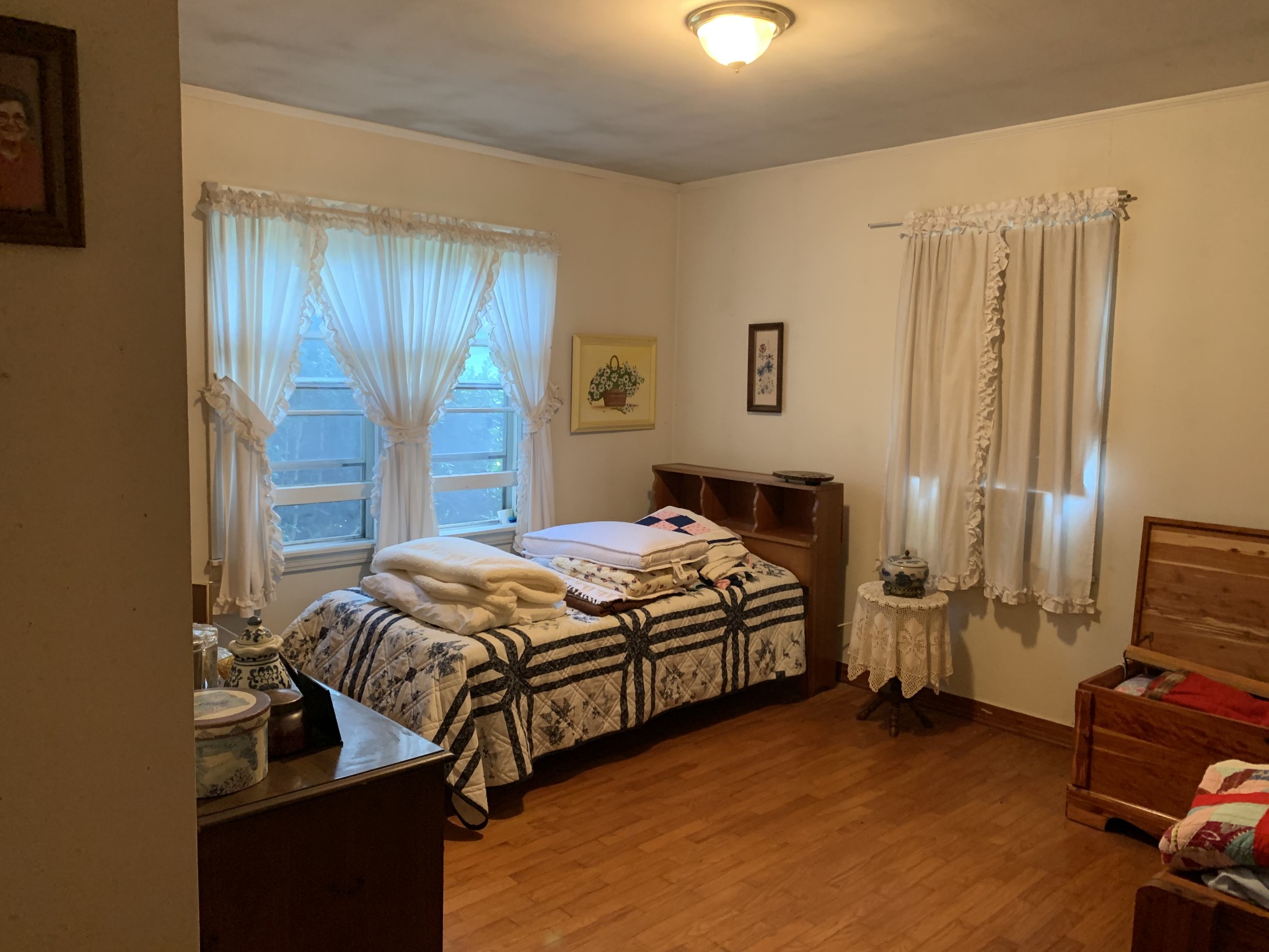 1585 Laster School Road Huron, TN 38345 - Photo 9 of 14 a bedroom with a bed and a tv