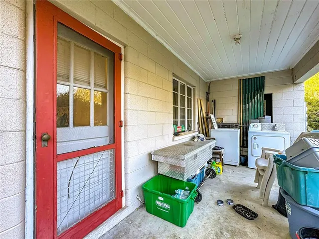 a view of a lake with houses in the back