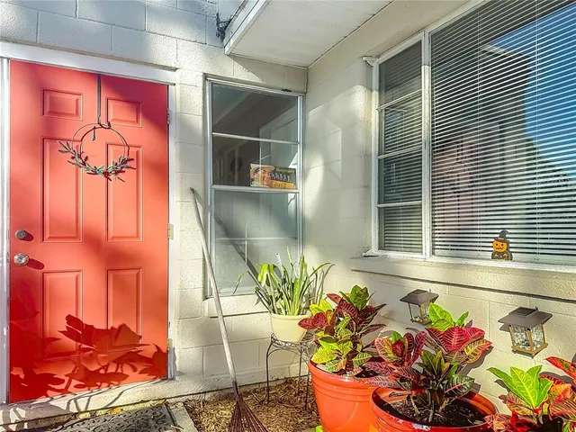 a kitchen with stainless steel appliances a refrigerator and cabinets