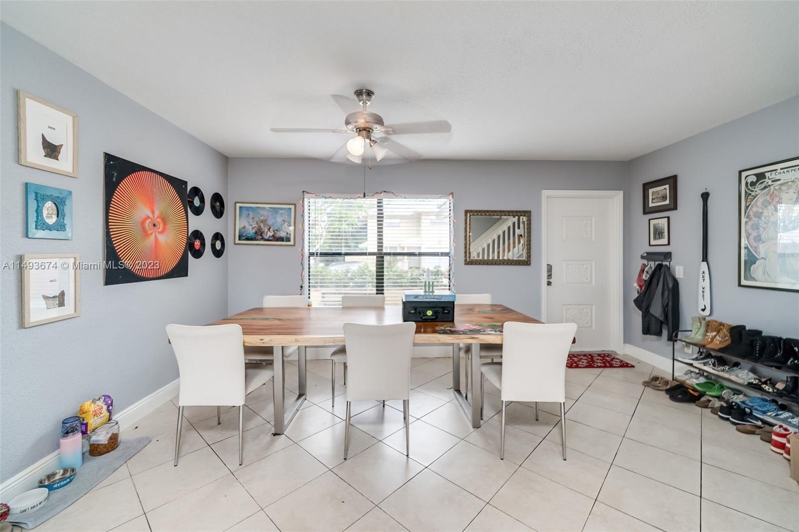 256 Southwest 6th Street, Unit 6 Boca Raton, FL 33432 - Photo 10 of 39 a view of a livingroom with furniture and a window