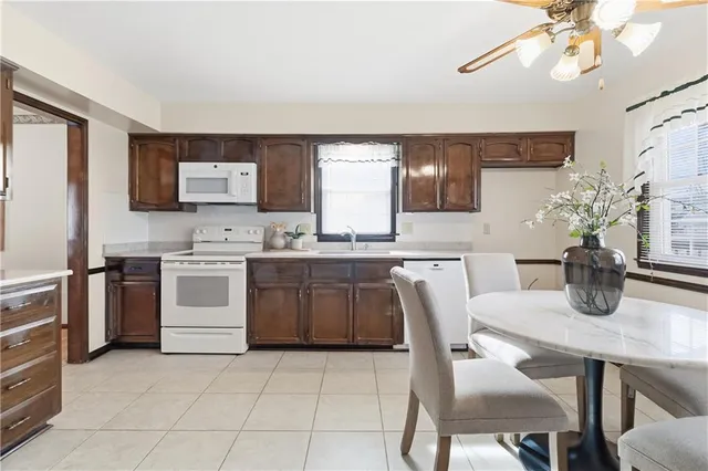 $395,000 | 10250 Caenen Drive, Lenexa, KS 66215