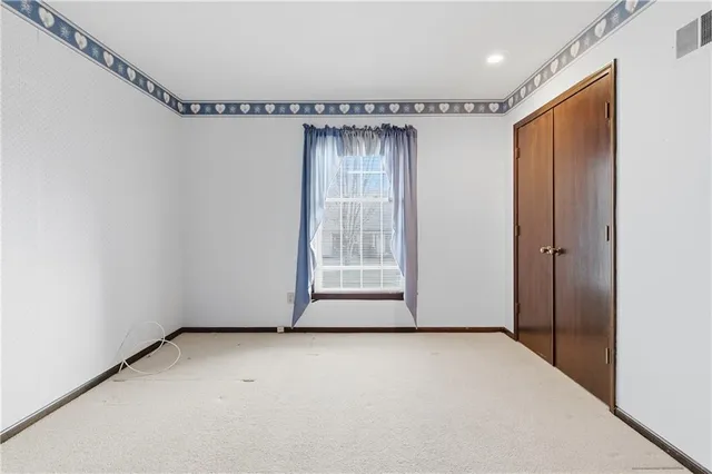 $395,000 | 10250 Caenen Drive, Lenexa, KS 66215