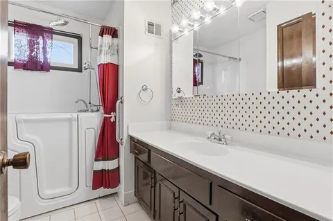 $395,000 | 10250 Caenen Drive, Lenexa, KS 66215