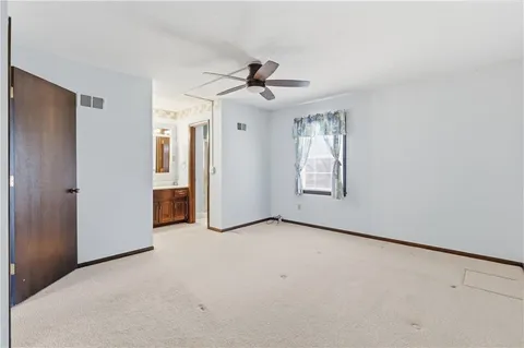 $395,000 | 10250 Caenen Drive, Lenexa, KS 66215