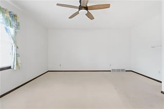 $395,000 | 10250 Caenen Drive, Lenexa, KS 66215