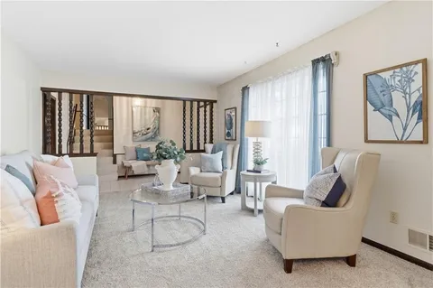 $395,000 | 10250 Caenen Drive, Lenexa, KS 66215