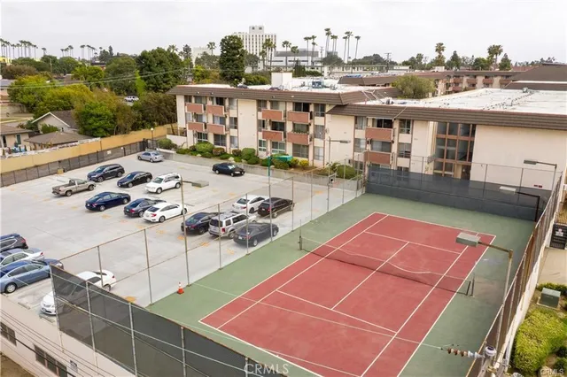 an aerial view of residential houses with swimming pool