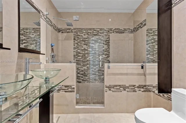 a bathroom with a toilet and a sink