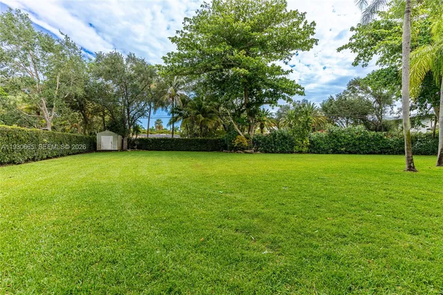 an aerial view of a house with a garden