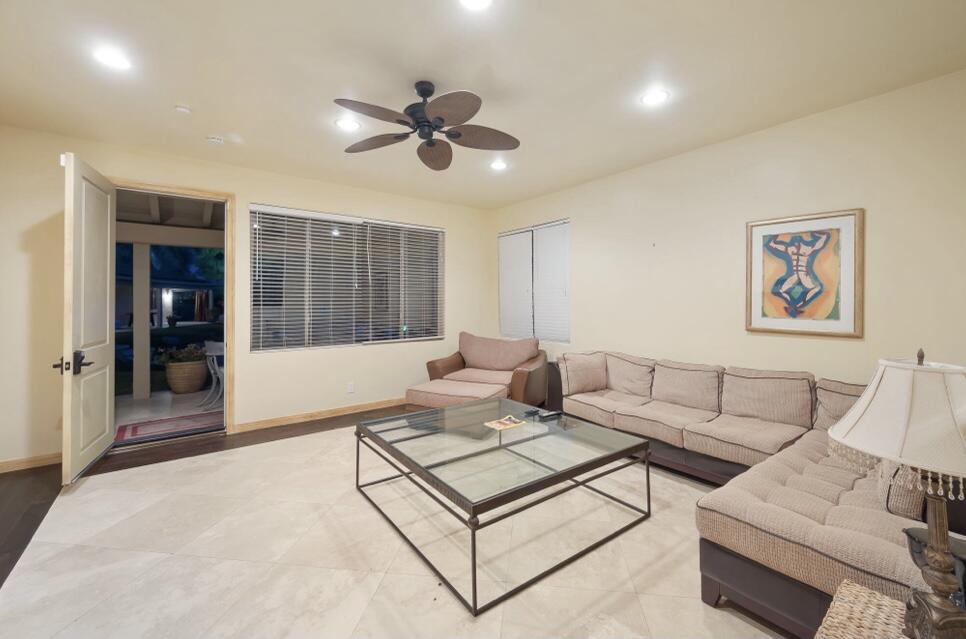 71111 La Paz Road Rancho Mirage, CA 92270 - Photo 32 of 102 a living room with furniture and a large window