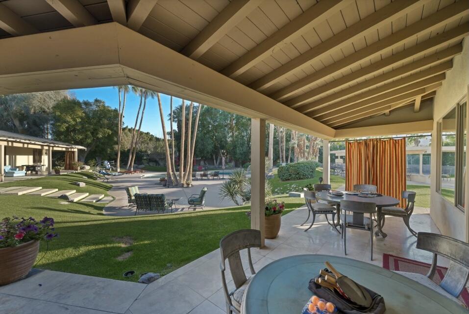 71111 La Paz Road Rancho Mirage, CA 92270 - Photo 38 of 102 a house view with a sitting space and garden