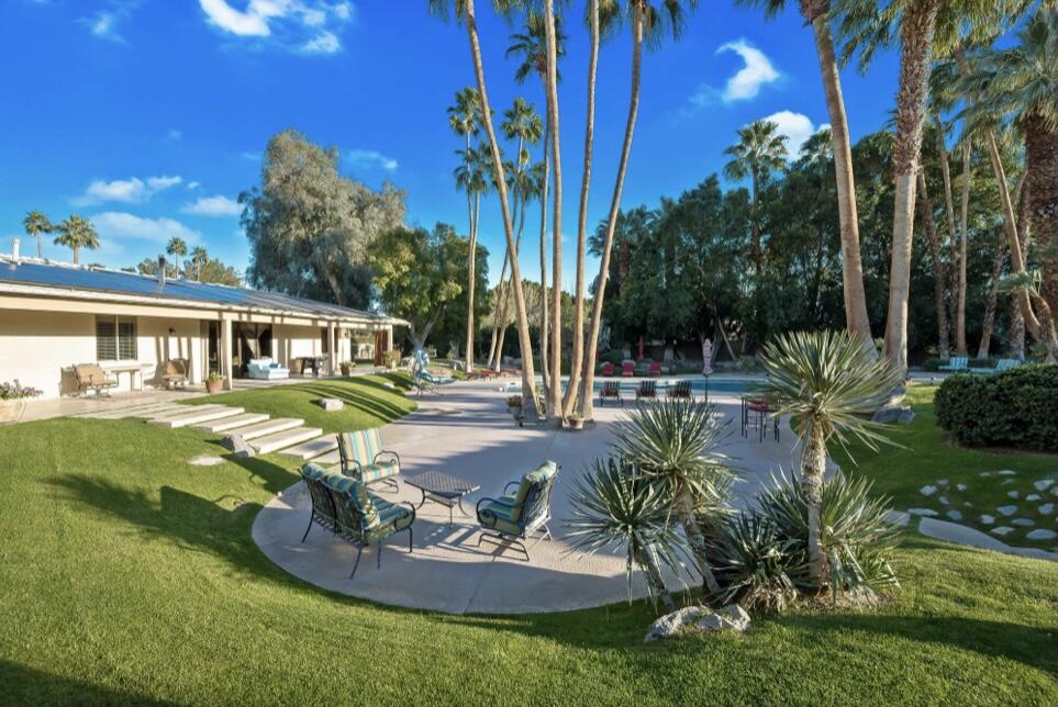 71111 La Paz Road Rancho Mirage, CA 92270 - Photo 42 of 102 a view of a house with backyard and sitting area