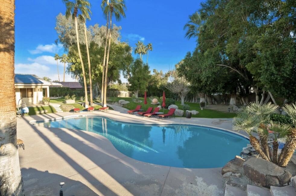 71111 La Paz Road Rancho Mirage, CA 92270 - Photo 44 of 102 a view of a swimming pool with a patio