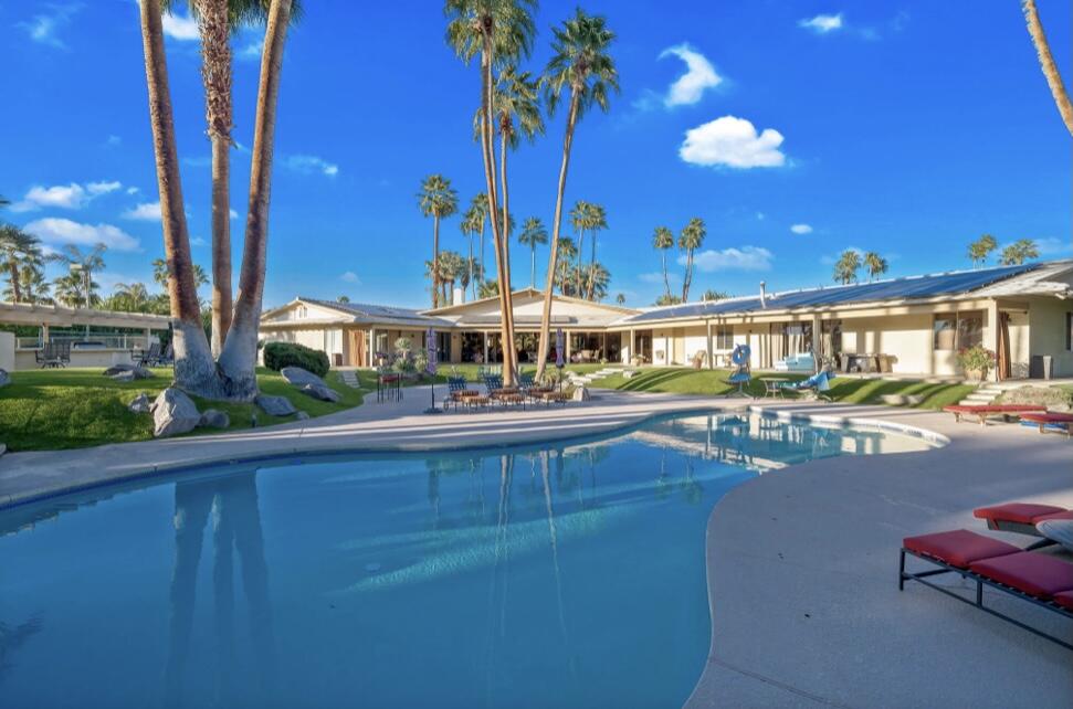 71111 La Paz Road Rancho Mirage, CA 92270 - Photo 54 of 102 a view of a swimming pool with outdoor seating