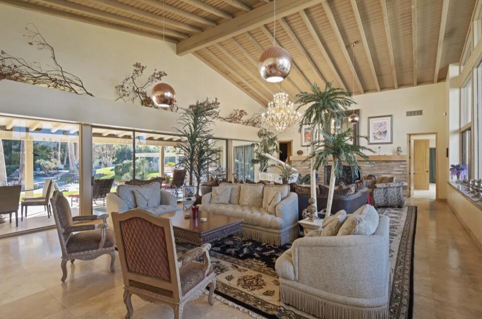 71111 La Paz Road Rancho Mirage, CA 92270 - Photo 6 of 102 a living room with furniture and a large window