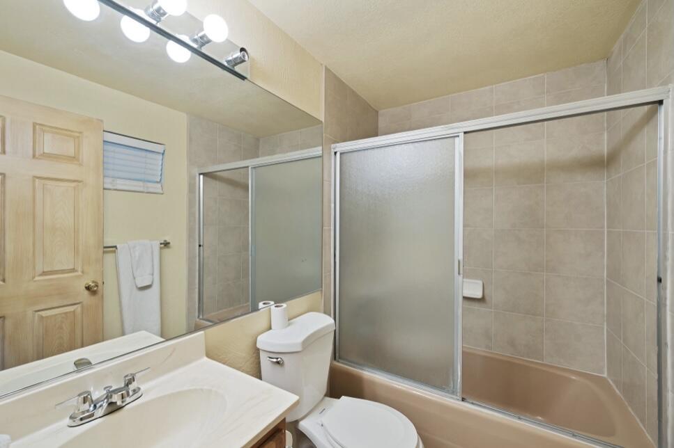 71111 La Paz Road Rancho Mirage, CA 92270 - Photo 68 of 102 a bathroom with a sink toilet and shower