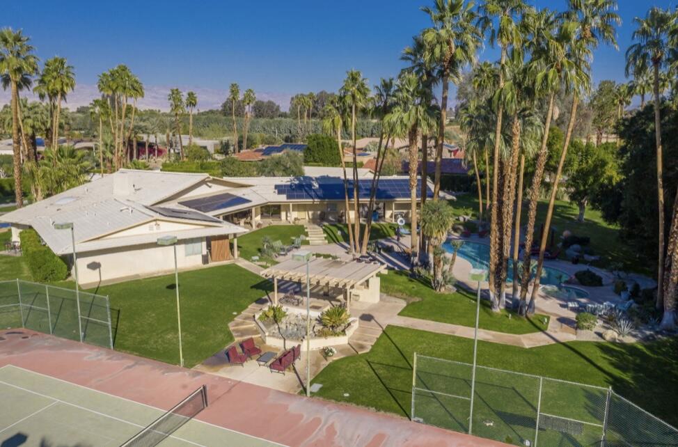 71111 La Paz Road Rancho Mirage, CA 92270 - Photo 78 of 102 a view of a tennis ground with large trees