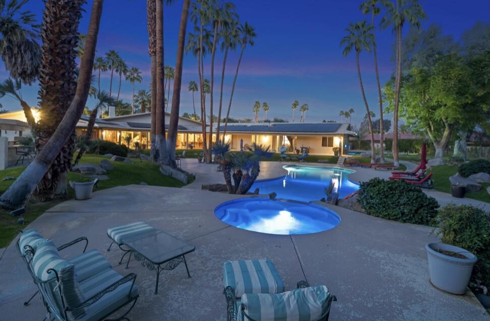71111 La Paz Road Rancho Mirage, CA 92270 - Photo 85 of 102 a backyard of a house with outdoor seating