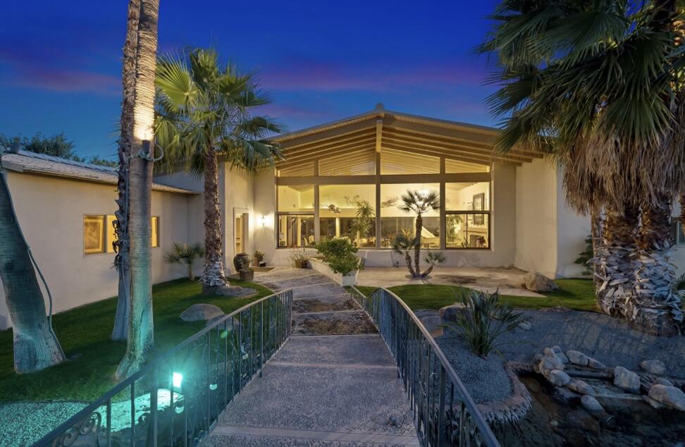 71111 La Paz Road Rancho Mirage, CA 92270 - Photo 90 of 102 a view of a house with backyard and sitting area