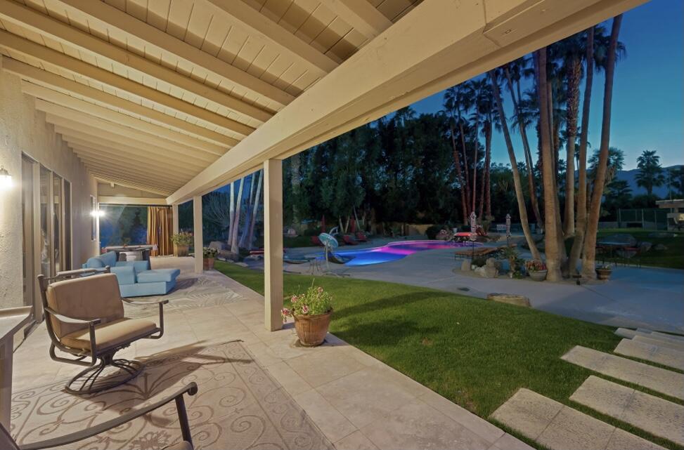 71111 La Paz Road Rancho Mirage, CA 92270 - Photo 95 of 102 a view of a backyard with sitting area and slide