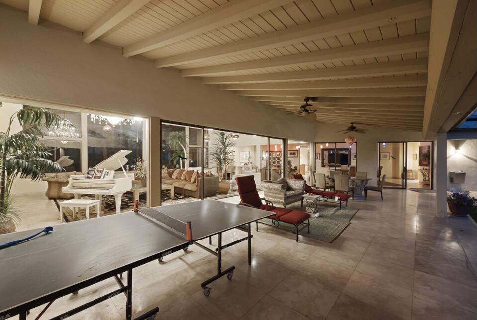 71111 La Paz Road Rancho Mirage, CA 92270 - Photo 96 of 102 a living room with furniture and a large window