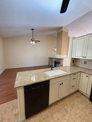 a view of a livingroom with wooden floor