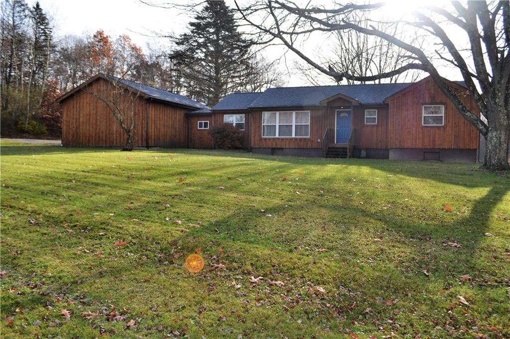 1220 State Rte 28 And 66 Templeton, PA 16259 - Photo 1 of 24 a front view of a house with a garden