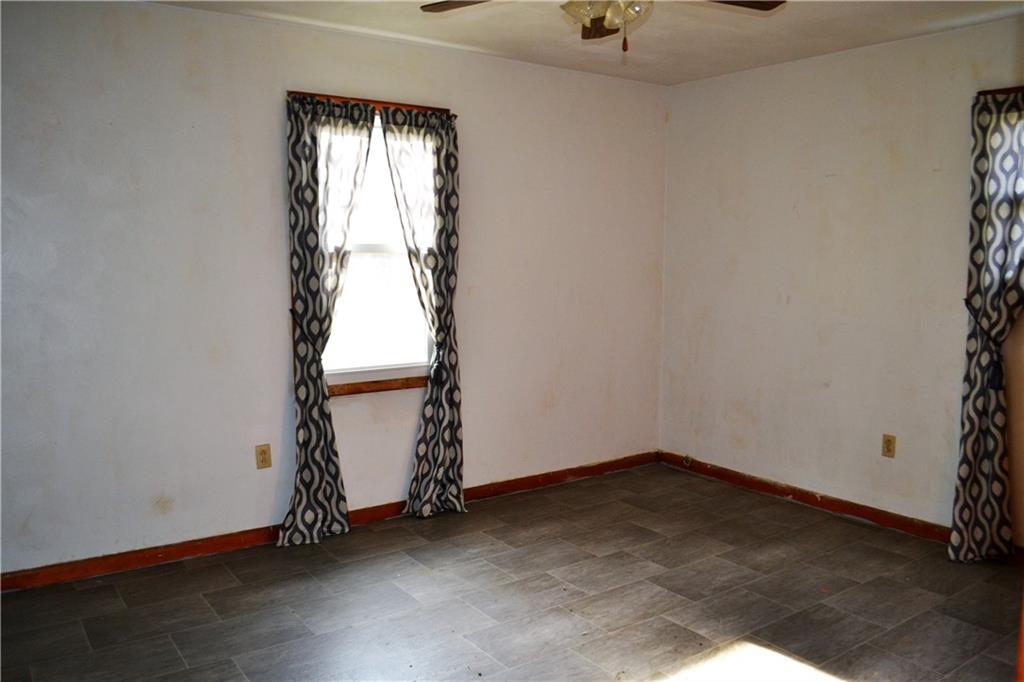 1220 State Rte 28 And 66 Templeton, PA 16259 - Photo 12 of 24 an empty room with wooden floor and windows