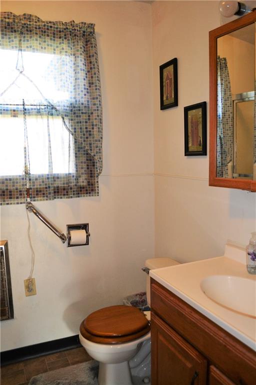 1220 State Rte 28 And 66 Templeton, PA 16259 - Photo 14 of 24 a bathroom with a sink a toilet and a mirror