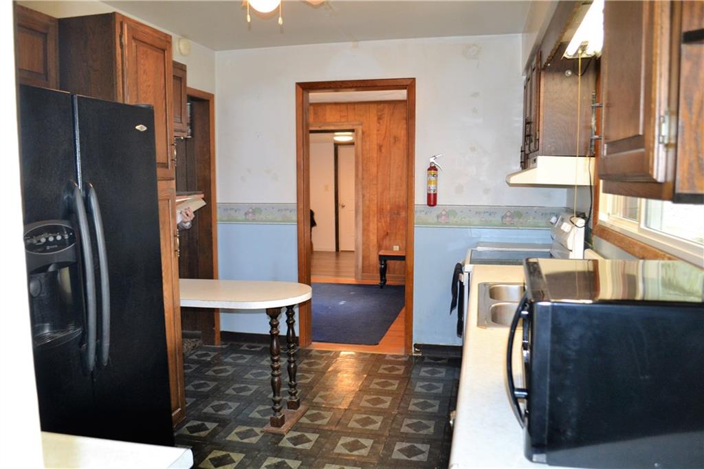 1220 State Rte 28 And 66 Templeton, PA 16259 - Photo 8 of 24 a kitchen with stainless steel appliances granite countertop a refrigerator and a stove