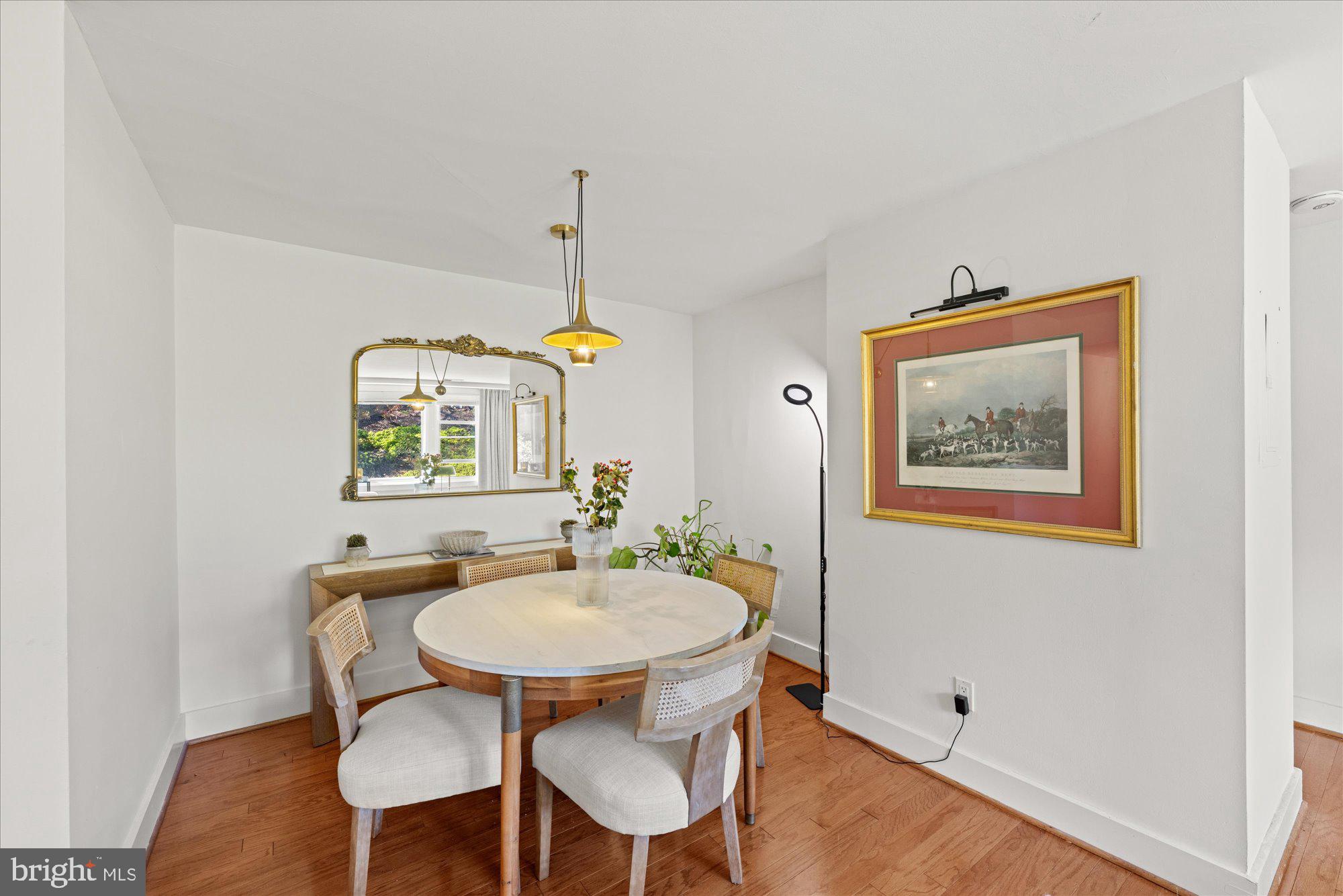 4840 MacArthur Boulevard Northwest, Unit 301 Washington, DC 20007 - Photo 5 of 24 a dining room with furniture and window