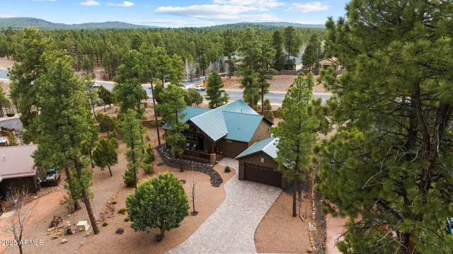 a view of a balcony with chair and a table