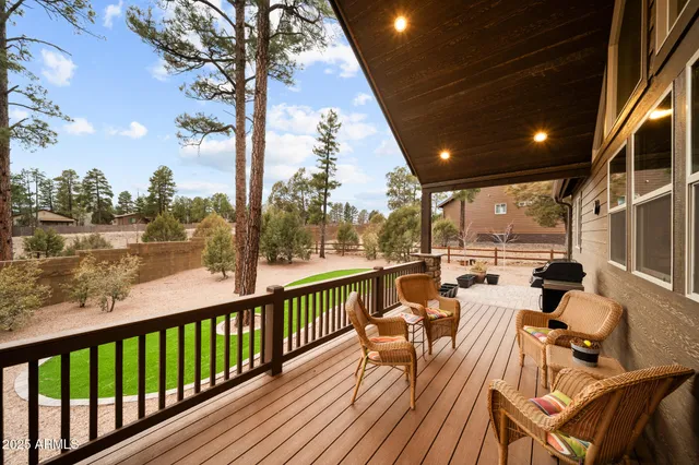 a view of balcony with furniture