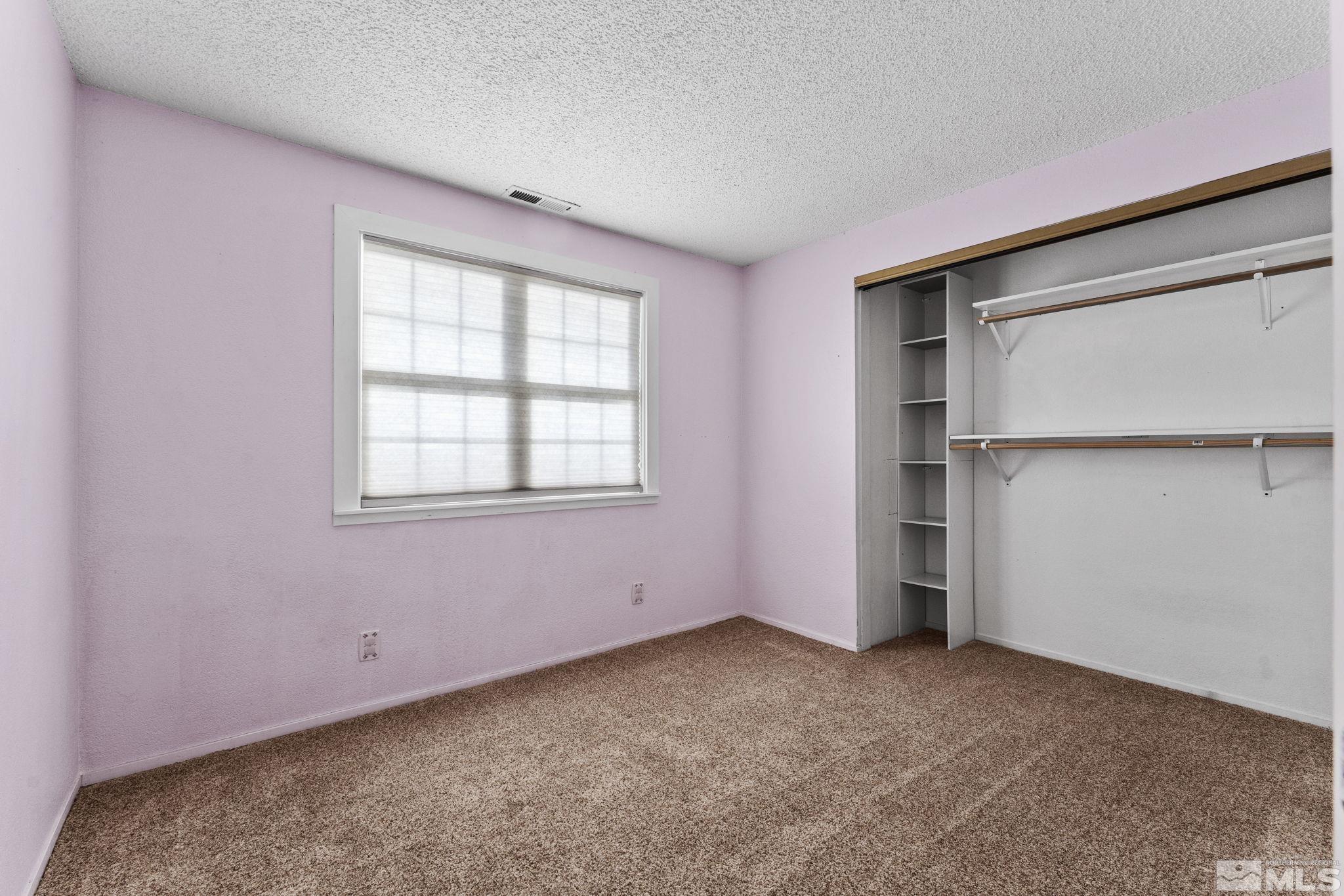 3810 Snipe Drive Reno, NV 89508 - Photo 20 of 38 a view of an empty room with a window