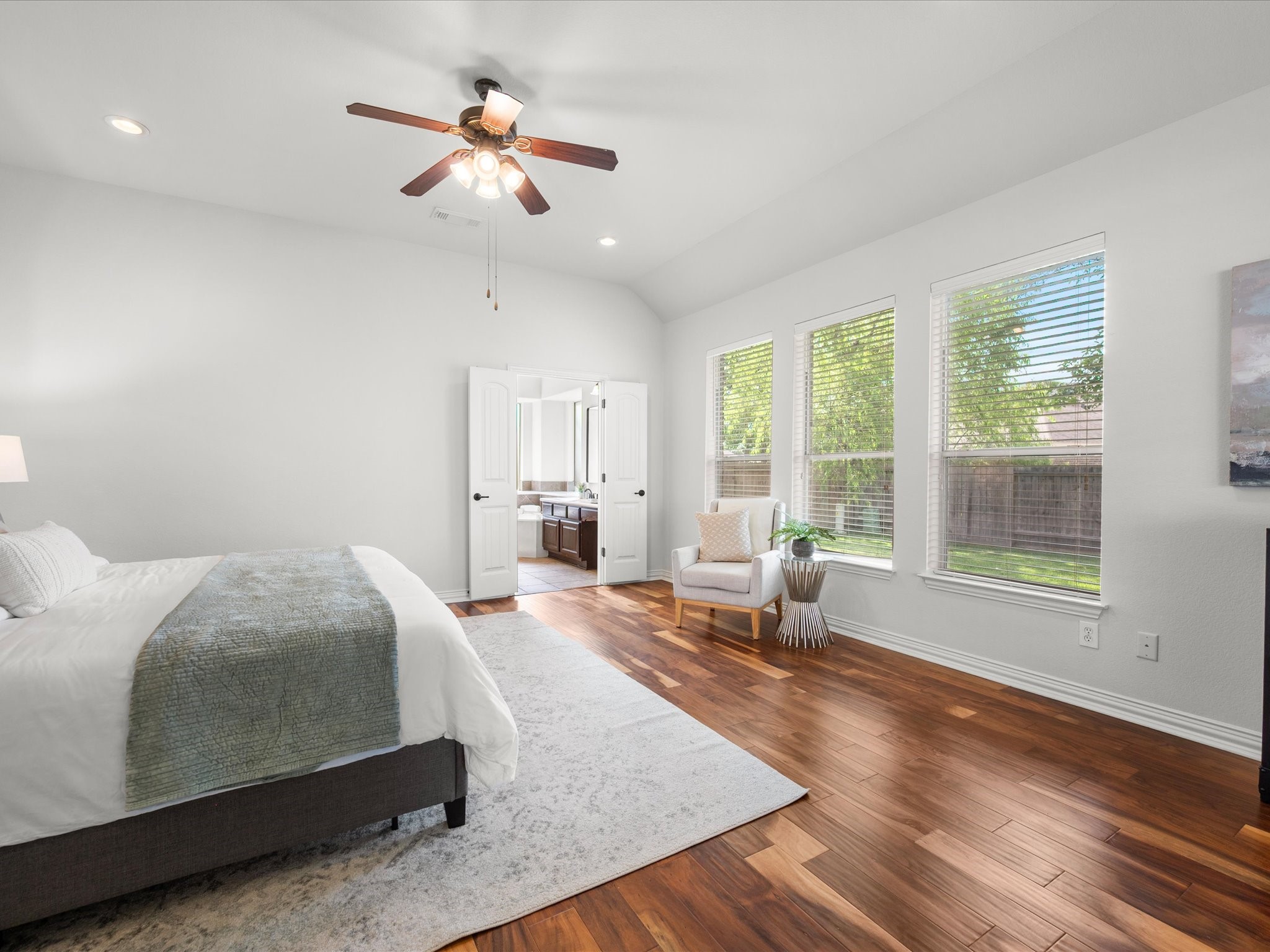323 Arbor Ridge Lane Conroe, TX 77384 - Photo 18 of 40 Wake up to backyard views and walk right into your spa-style bath through those double doors. Down, private, and big enough to breathe. This is the one.