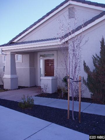 10437 Summershade Lane Reno, NV 89521 - Photo 2 of 9 a front view of a house
