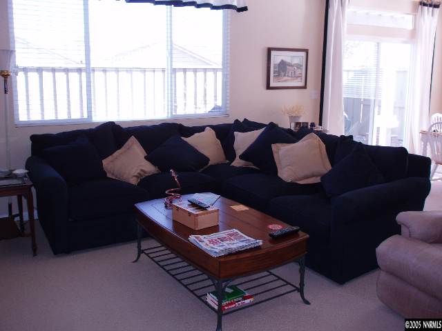 10437 Summershade Lane Reno, NV 89521 - Photo 6 of 9 a living room with furniture and a window