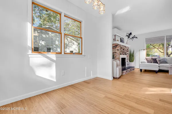 a view of livingroom with furniture window and front door
