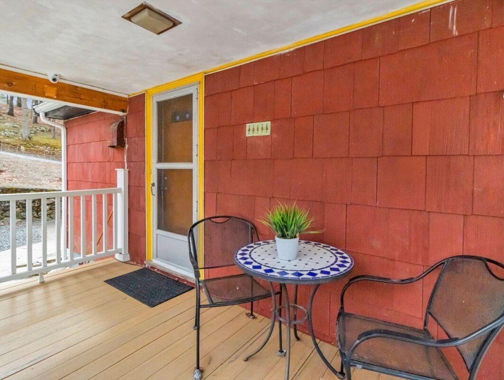 222 Walnut Street Saugus, MA 01906 - Photo 34 of 42 a backyard of a house with table and chairs