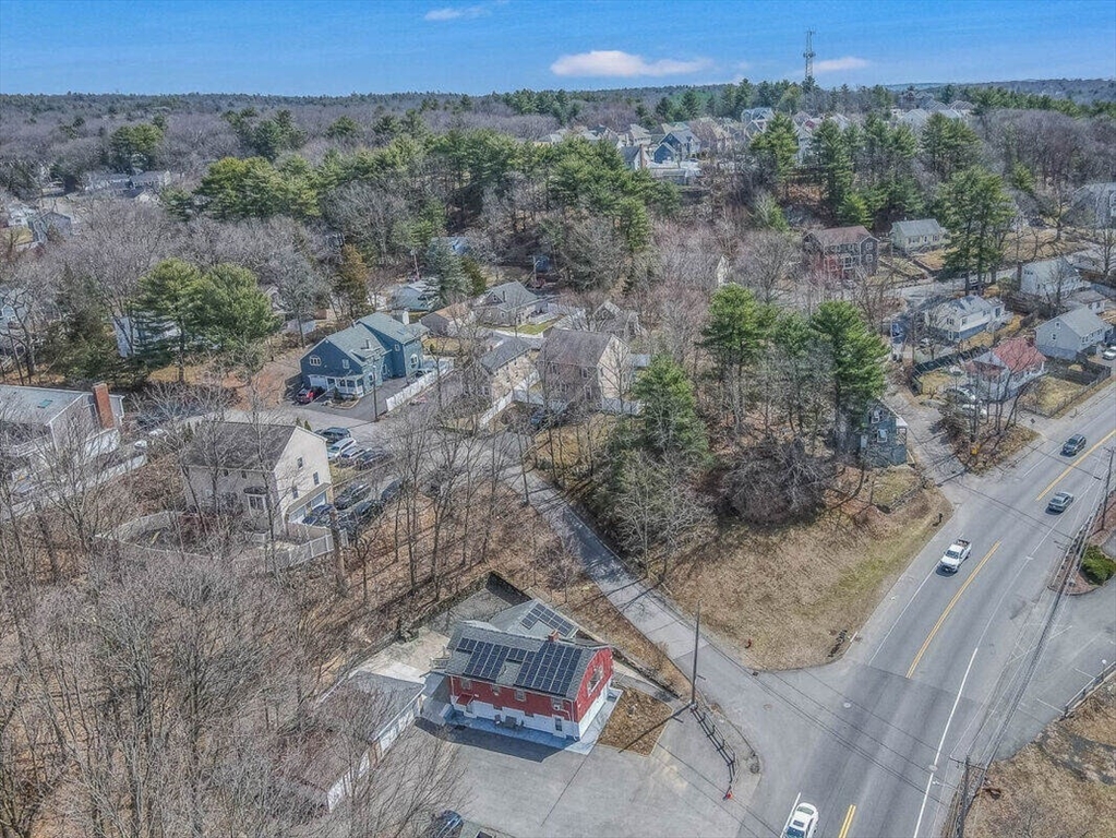 222 Walnut Street Saugus, MA 01906 - Photo 37 of 42 a view of a dry field with trees in the background