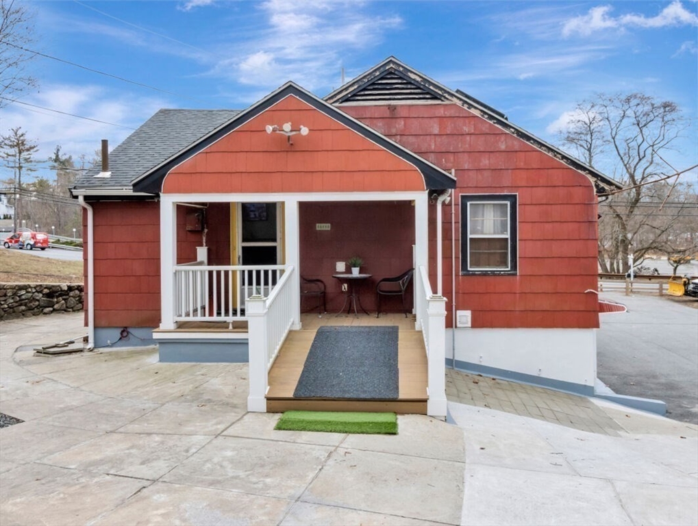 222 Walnut Street Saugus, MA 01906 - Photo 6 of 42 a front view of a house with a porch