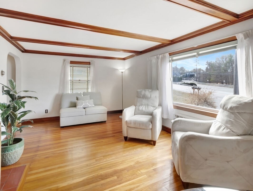 222 Walnut Street Saugus, MA 01906 - Photo 9 of 42 a living room with furniture and a large window