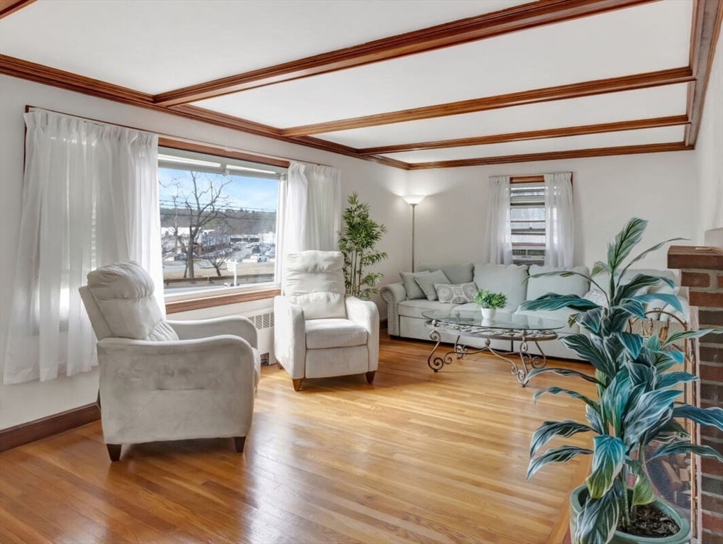 222 Walnut Street Saugus, MA 01906 - Photo 10 of 42 a living room with furniture and a large window
