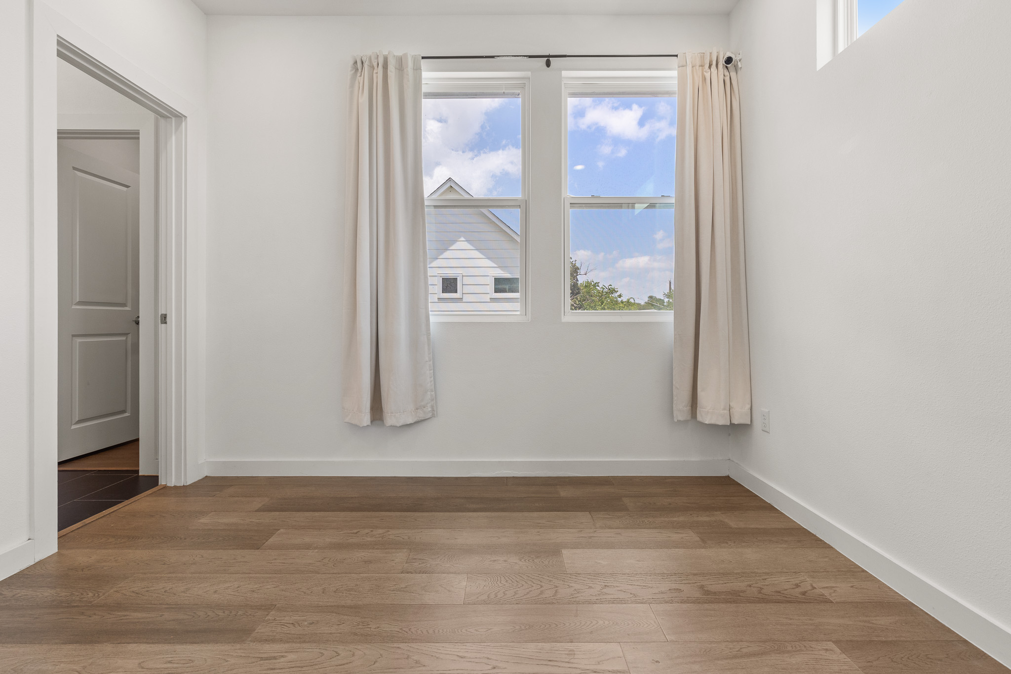 2604 Wheless Lane, Unit 1 Austin, TX 78723 - Photo 27 of 38 High ceilings and generous dimensions make the space feel open and comfortable.