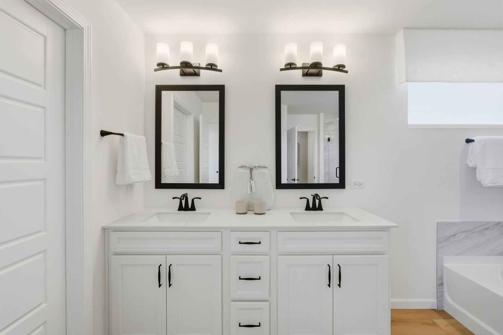 660 Redtop Way Bolingbrook, IL 60490 - Photo 20 of 22 a bathroom with double vanity sinks and a mirror