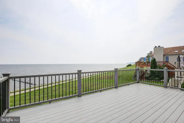 a view of wooden balcony with wooden floor