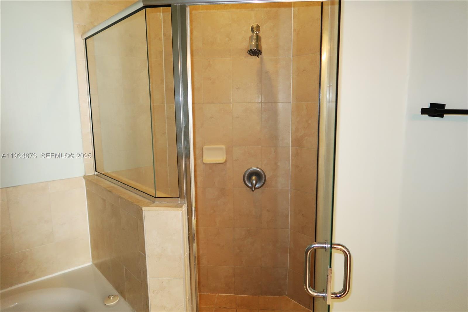 11334 Southwest 236th Street, Unit 11334 Homestead, FL 33032 - Photo 17 of 25 a bathroom with a shower